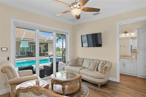 a view of a golf course with an ocean