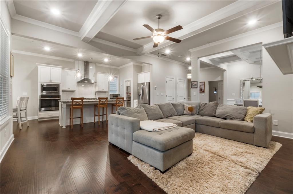 313 Senna Street Marietta, GA 30064 - Photo 13 of 43 a living room with furniture and kitchen view