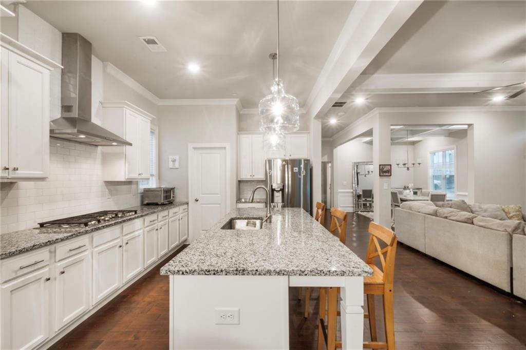 313 Senna Street Marietta, GA 30064 - Photo 16 of 43 a large kitchen with granite countertop lots of counter space and stainless steel appliances