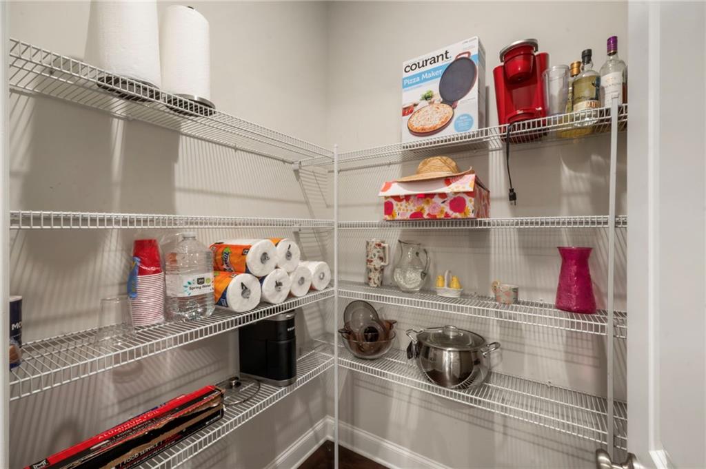 313 Senna Street Marietta, GA 30064 - Photo 22 of 43 a utility room with stainless steel appliances and cabinets