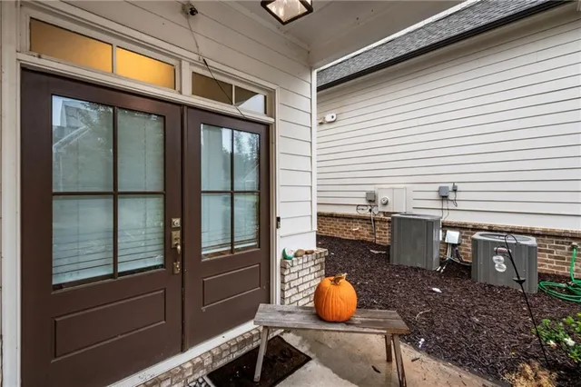 a view of an empty room with stairs