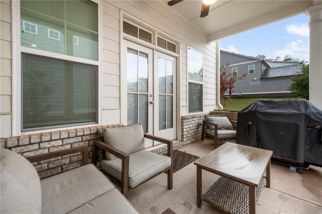 313 Senna Street Marietta, GA 30064 - Photo 39 of 43 a living room with furniture and a window