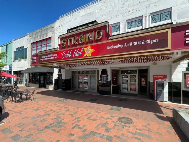 a view of a brick building with a large windows