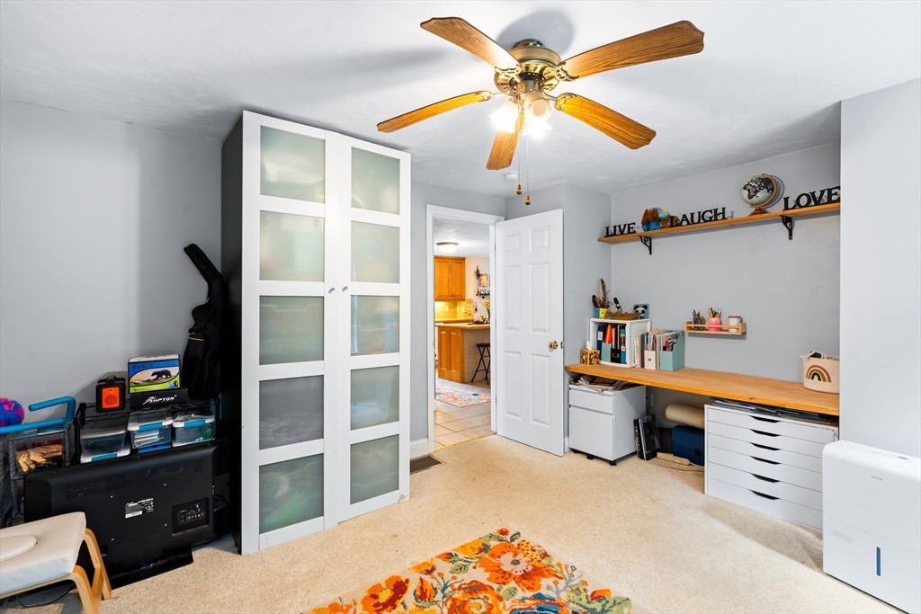 28 Birch Drive Petersham, MA 01366 - Photo 11 of 42 a view of a workspace with furniture and toys