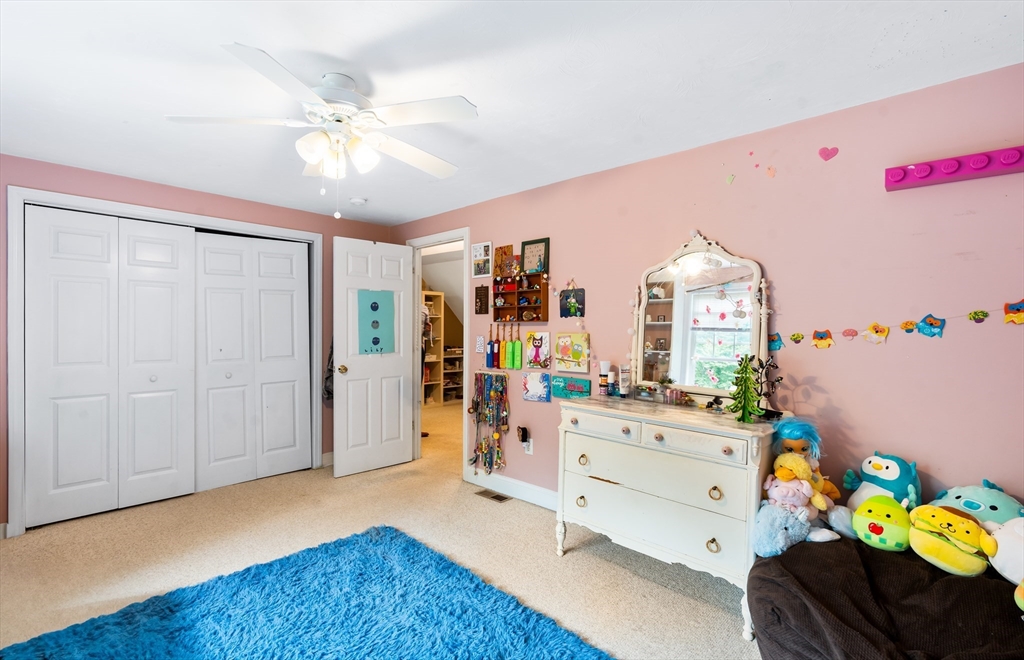 28 Birch Drive Petersham, MA 01366 - Photo 21 of 42 a bedroom with a bed and a dresser