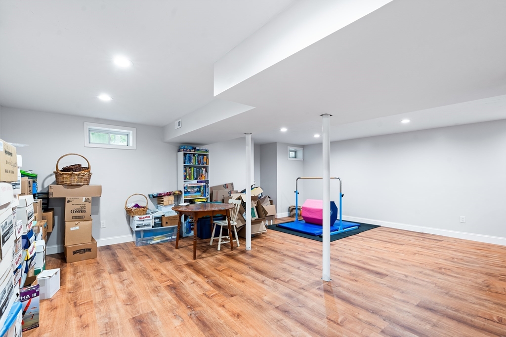 28 Birch Drive Petersham, MA 01366 - Photo 26 of 42 a living room with furniture and a wooden floor