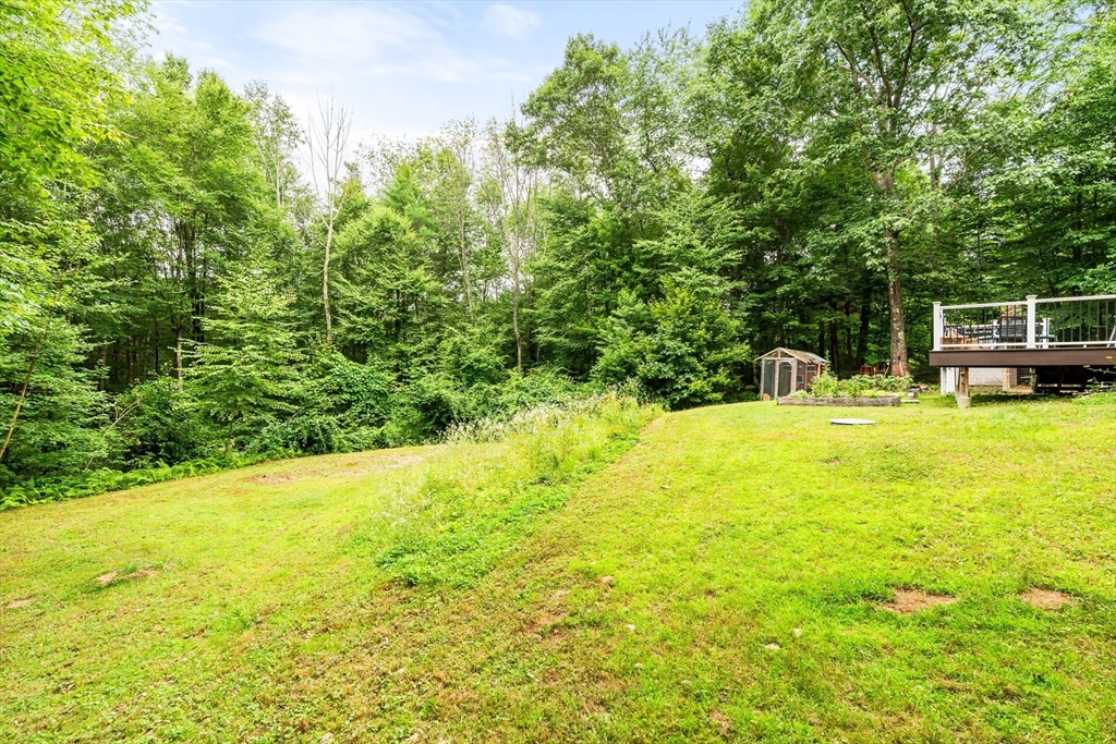 28 Birch Drive Petersham, MA 01366 - Photo 31 of 42 a view of a swimming pool with a patio