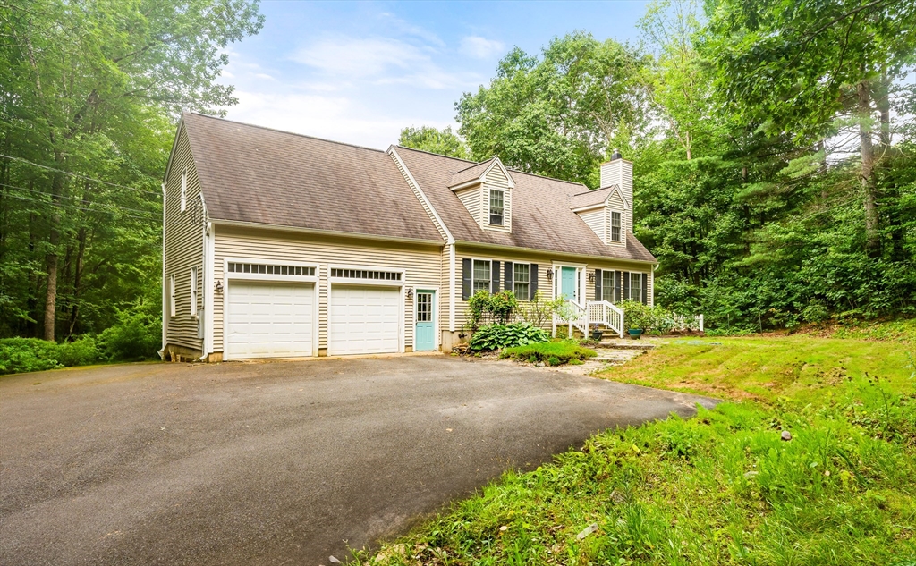 28 Birch Drive Petersham, MA 01366 - Photo 38 of 42 a view of a house with a yard and large trees