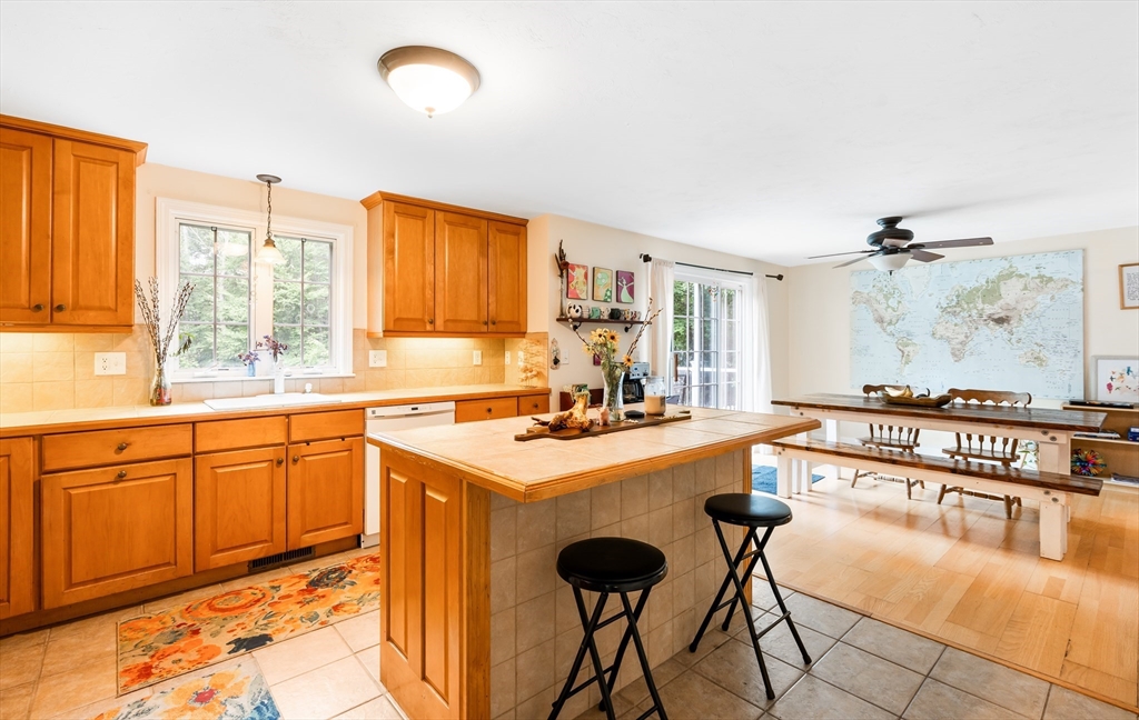 28 Birch Drive Petersham, MA 01366 - Photo 9 of 42 a kitchen with a stove a sink and a refrigerator