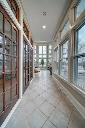 a hallway with a large window