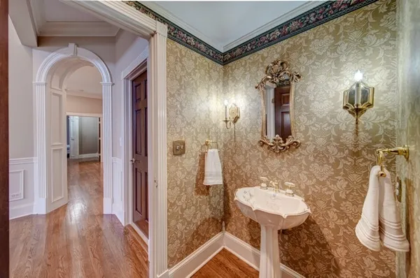 a bathroom with a sink and mirror