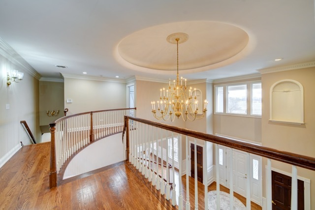 3870 North 3000 W Road Bourbonnais, IL 60914 - Photo 19 of 47 a view of a livingroom with furniture a dinning room and stairs