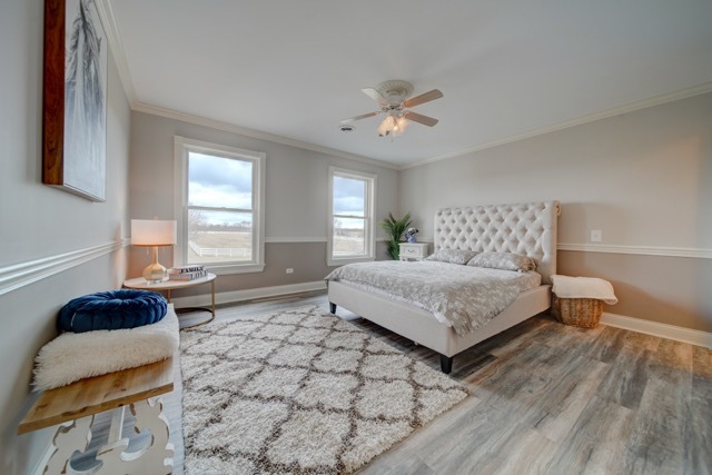 3870 North 3000 W Road Bourbonnais, IL 60914 - Photo 22 of 47 a bedroom with a bed and a window