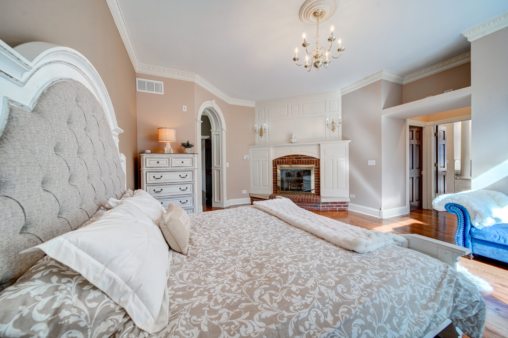 3870 North 3000 W Road Bourbonnais, IL 60914 - Photo 34 of 47 a bedroom with a large bed and a dresser