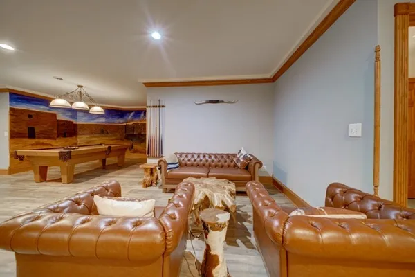 a bed room with two beds and a television