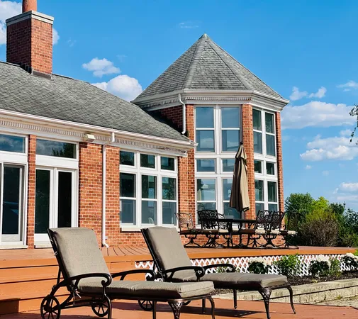 a view of a building with sitting area