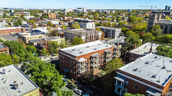 an aerial view of a city with lots of residential buildings