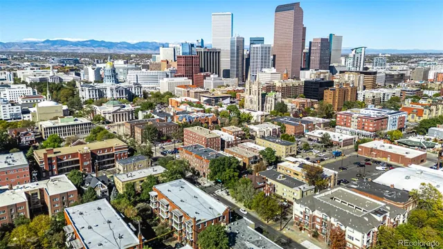 an aerial view of a city with lots of residential buildings