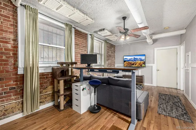 a kitchen with stainless steel appliances granite countertop a stove and a refrigerator