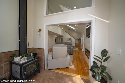 a living room with furniture and a table