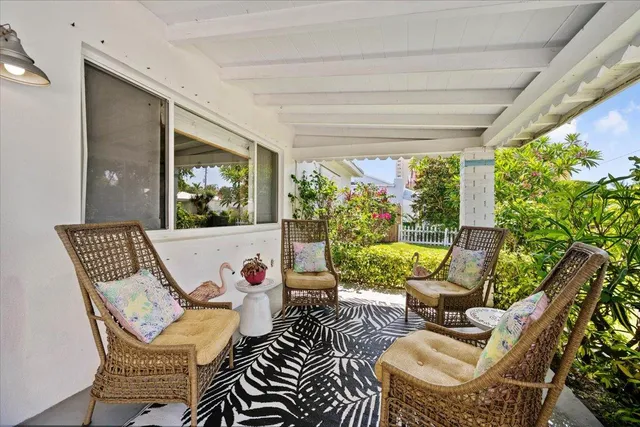 a outdoor space with patio the couches and a dining table with garden view