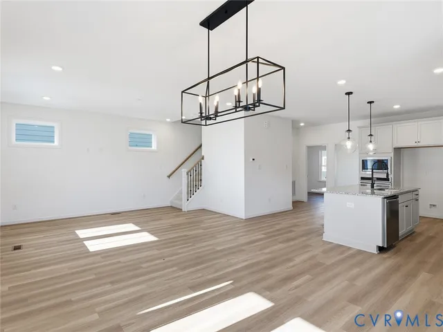 a view of livingroom and hardwood floor