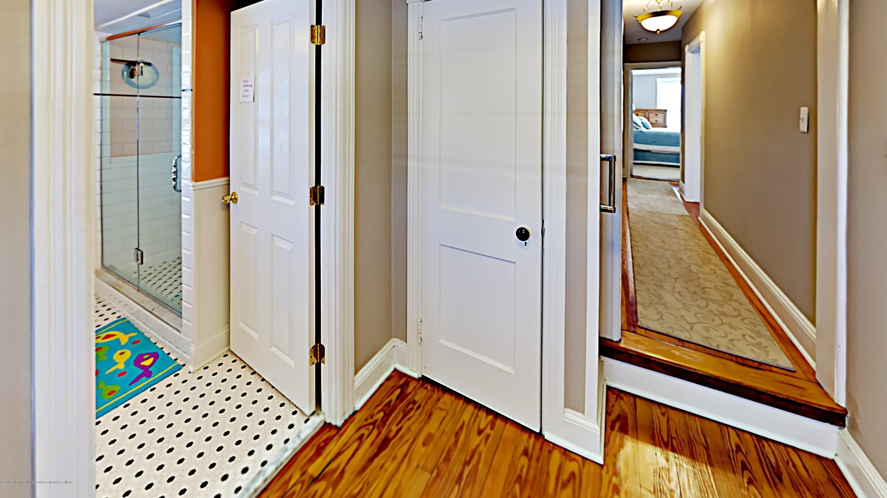 606 Ocean Road Spring Lake Heights, NJ 07762 - Photo 24 of 42 a view of an entryway with wooden floor