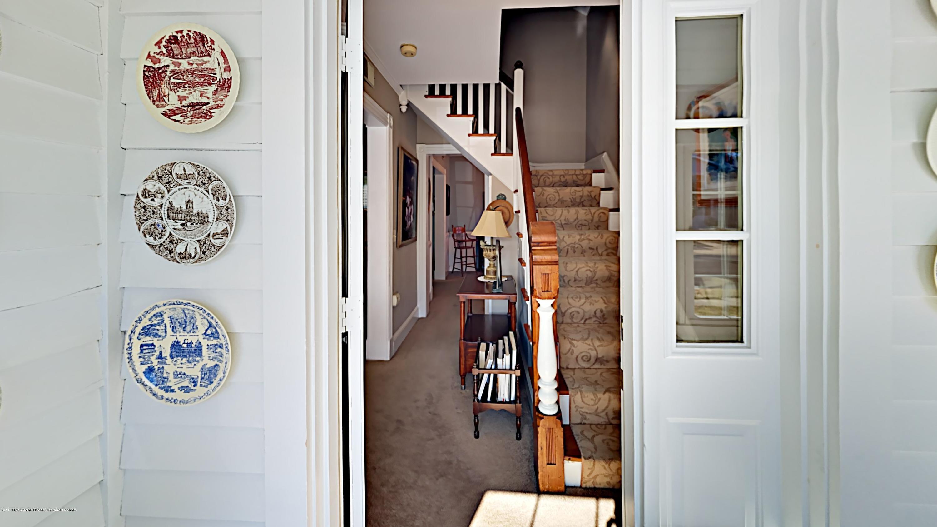 606 Ocean Road Spring Lake Heights, NJ 07762 - Photo 5 of 42 a view of a hallway with elevator