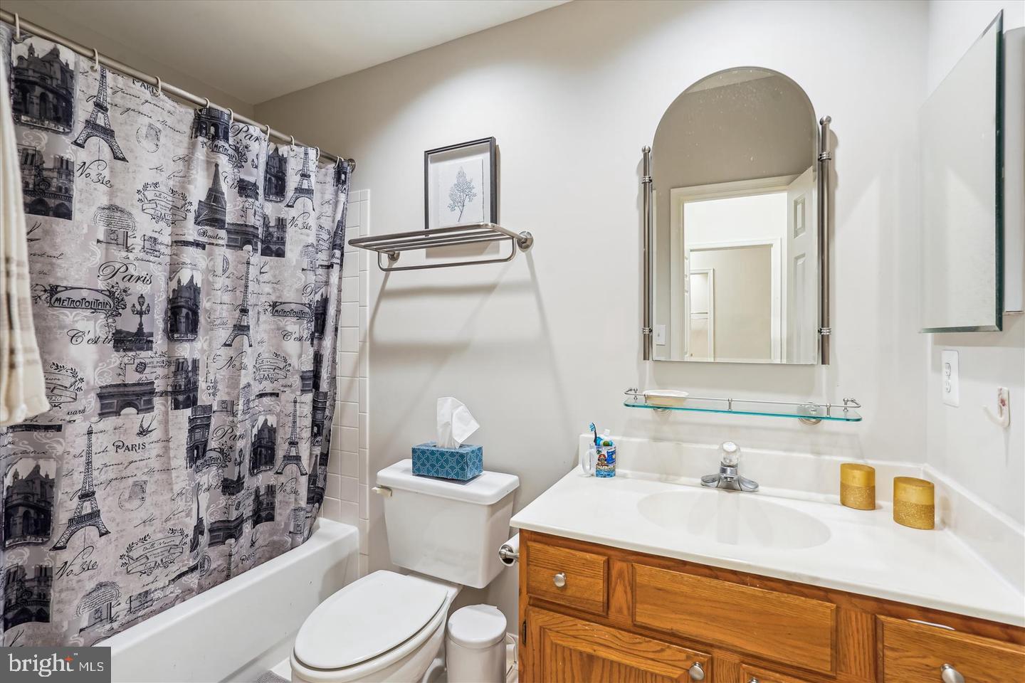 1334 Garden Wall Circle, Unit C Reston, VA 20194 - Photo 13 of 22 a bathroom with a sink toilet vanity and shower