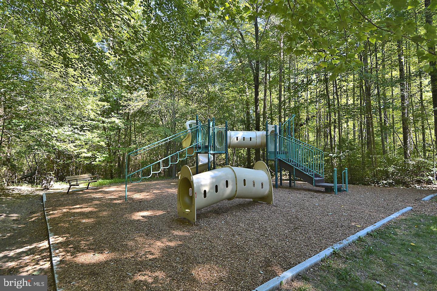 1334 Garden Wall Circle, Unit C Reston, VA 20194 - Photo 20 of 22 a view of a park with large trees