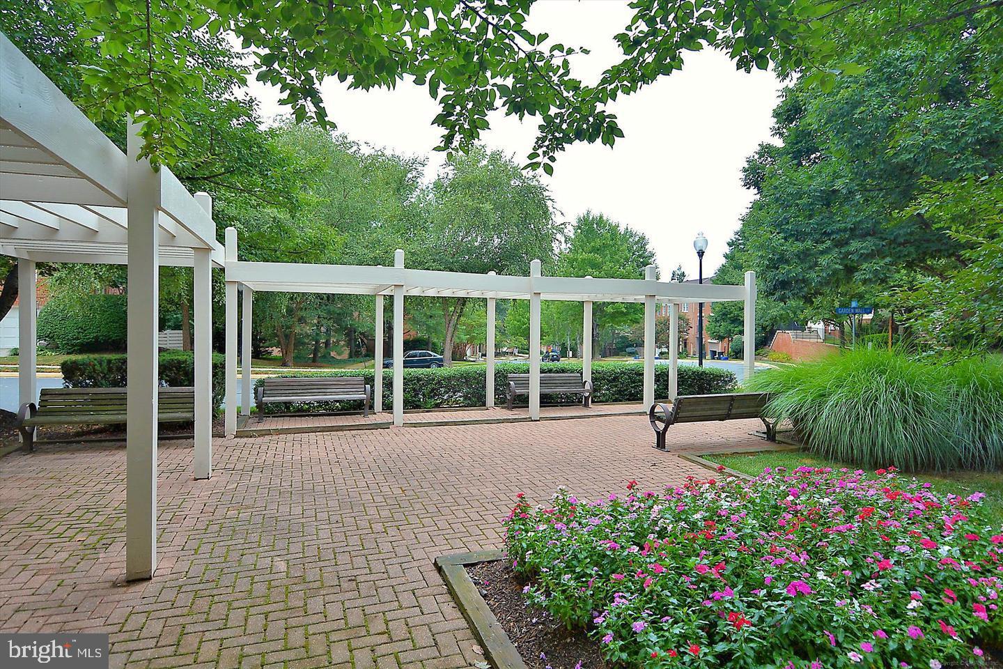 1334 Garden Wall Circle, Unit C Reston, VA 20194 - Photo 22 of 22 a view of a house with backyard and sitting area