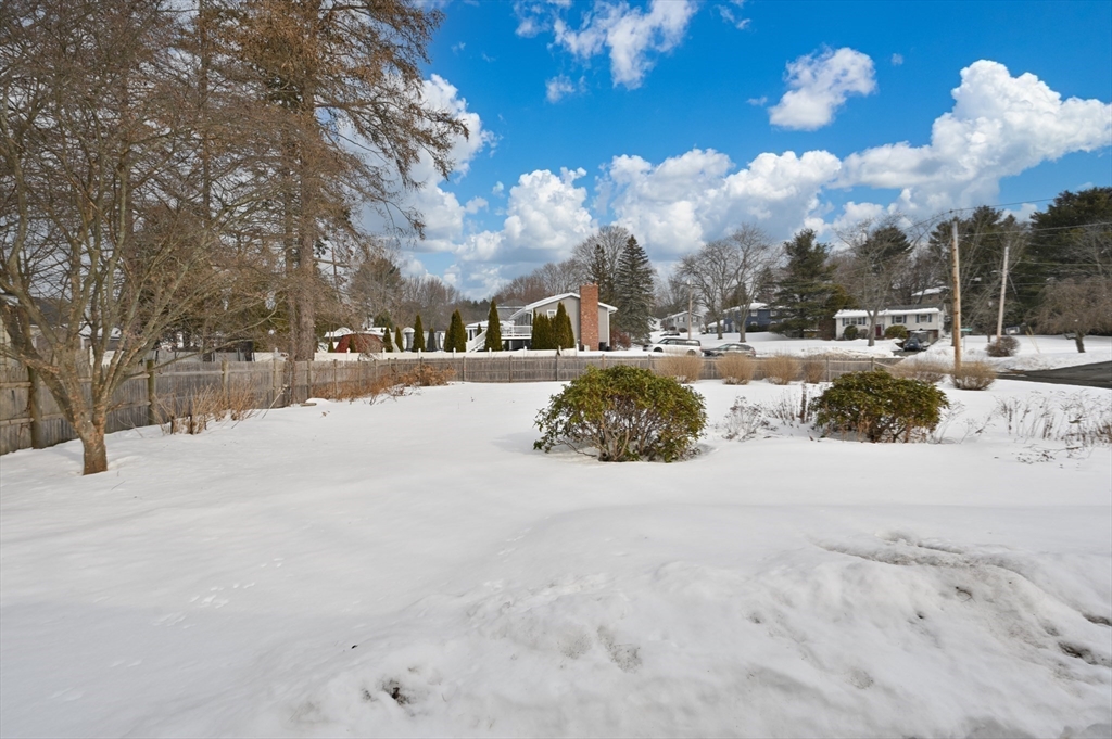 2 Iroquois Road Danvers, MA 01923 - Photo 28 of 30 a view of a yard covered in snow