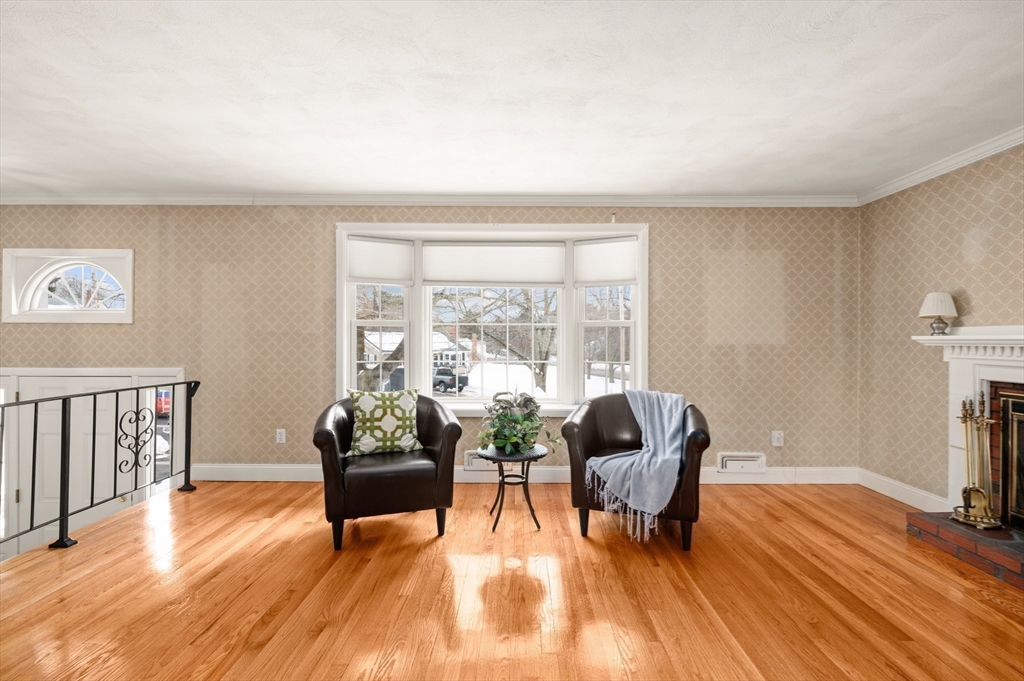2 Iroquois Road Danvers, MA 01923 - Photo 3 of 30 a living room with furniture and a wooden floor