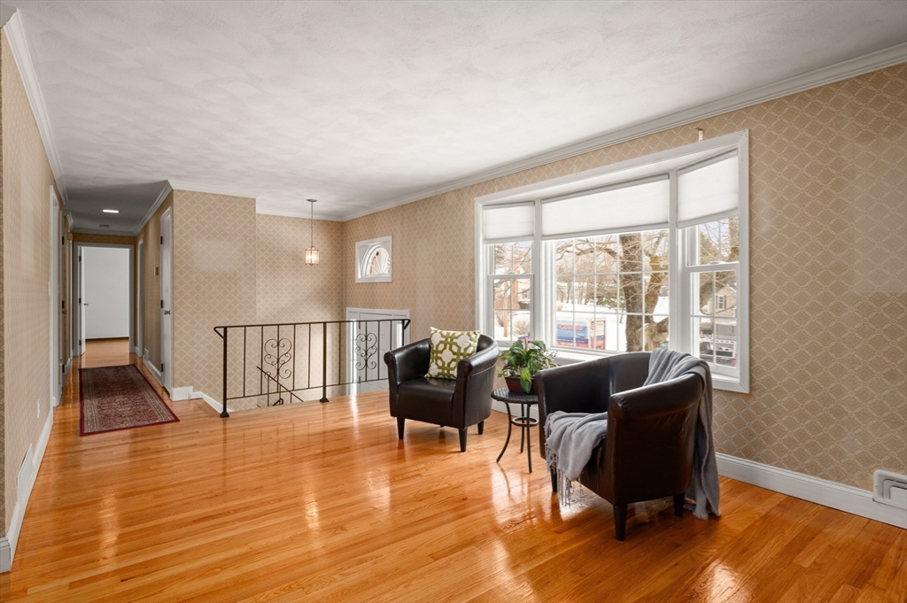 2 Iroquois Road Danvers, MA 01923 - Photo 4 of 30 a living room with furniture floor to ceiling window and wooden floor