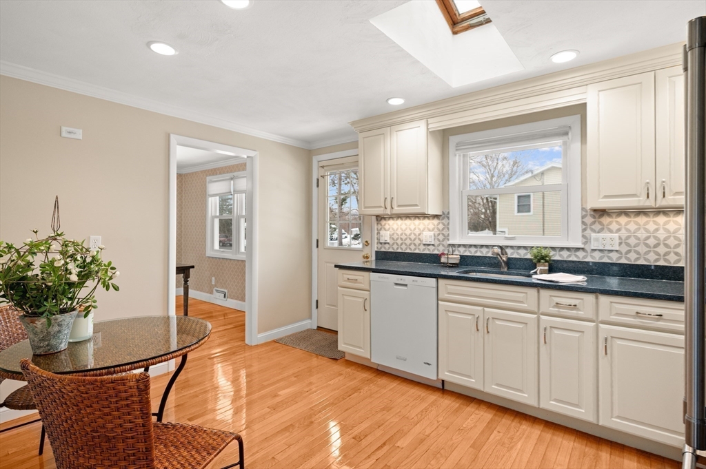 2 Iroquois Road Danvers, MA 01923 - Photo 9 of 30 a spacious bathroom with a granite countertop sink a mirror and a bathtub