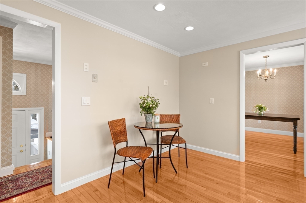 2 Iroquois Road Danvers, MA 01923 - Photo 10 of 30 a view of a dining room with furniture and wooden floor