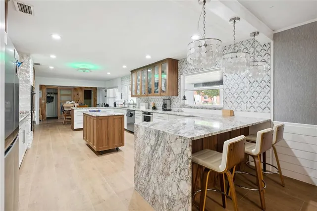 a bedroom with a bed furniture and a window