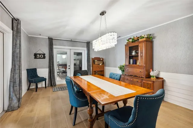 a bathroom with a sink and a large mirror
