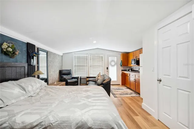 an aerial view of a house with a yard and garden