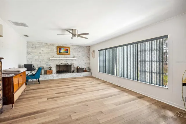 a kitchen with stainless steel appliances granite countertop a stove and a refrigerator