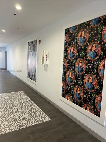 a view of entryway with wooden floor