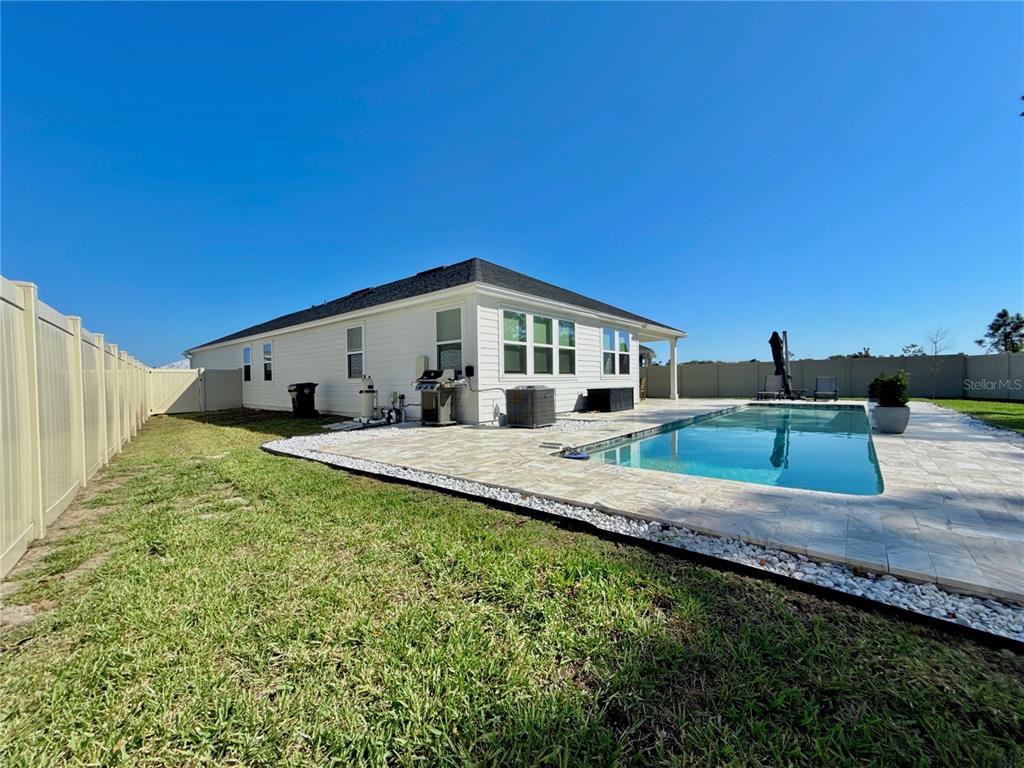 36 Signet Circle Flagler Beach, FL 32136 - Photo 20 of 45 a front view of a house with a yard