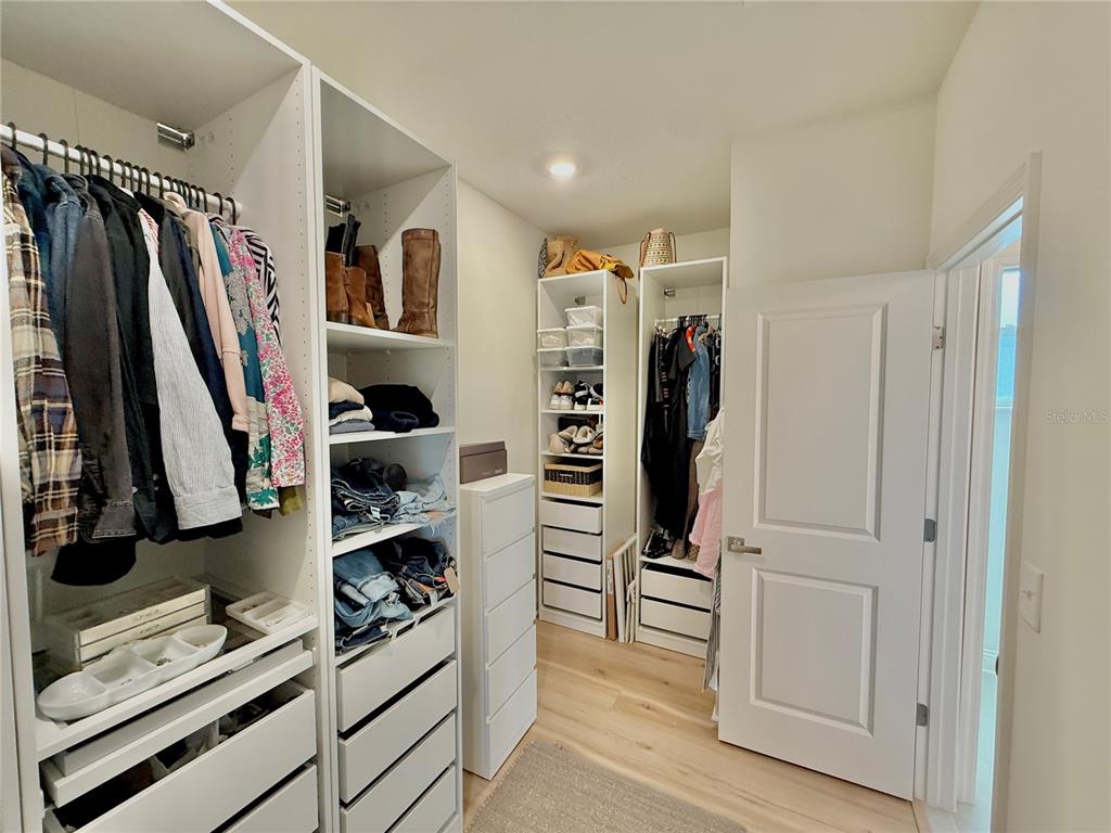 36 Signet Circle Flagler Beach, FL 32136 - Photo 27 of 45 a view of walk in closet with clothes and shoes