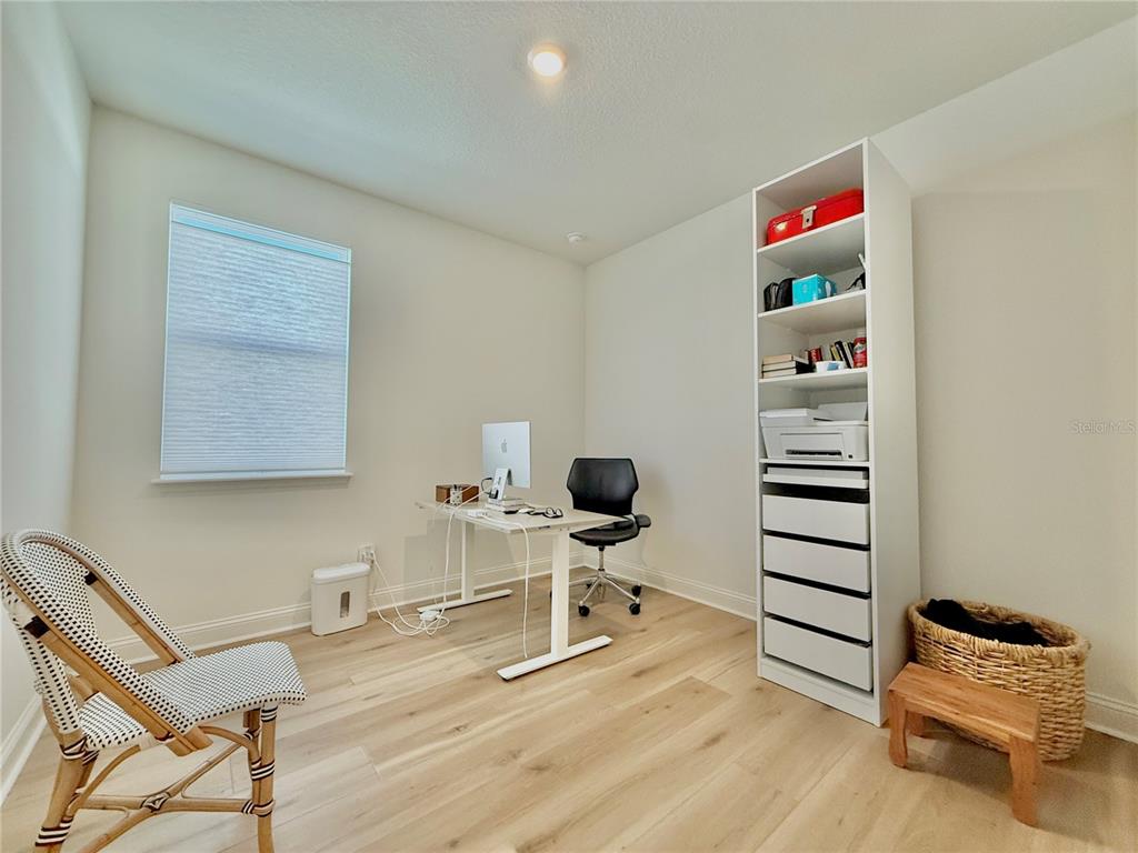 36 Signet Circle Flagler Beach, FL 32136 - Photo 35 of 45 a workspace with furniture and rug