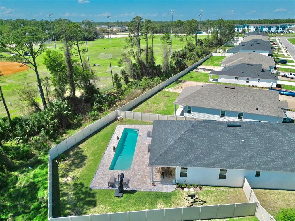 36 Signet Circle Flagler Beach, FL 32136 - Photo 4 of 45 an aerial view of a house with a yard