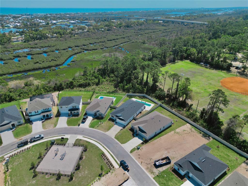 36 Signet Circle Flagler Beach, FL 32136 - Photo 44 of 45 an aerial view of a house with a garden