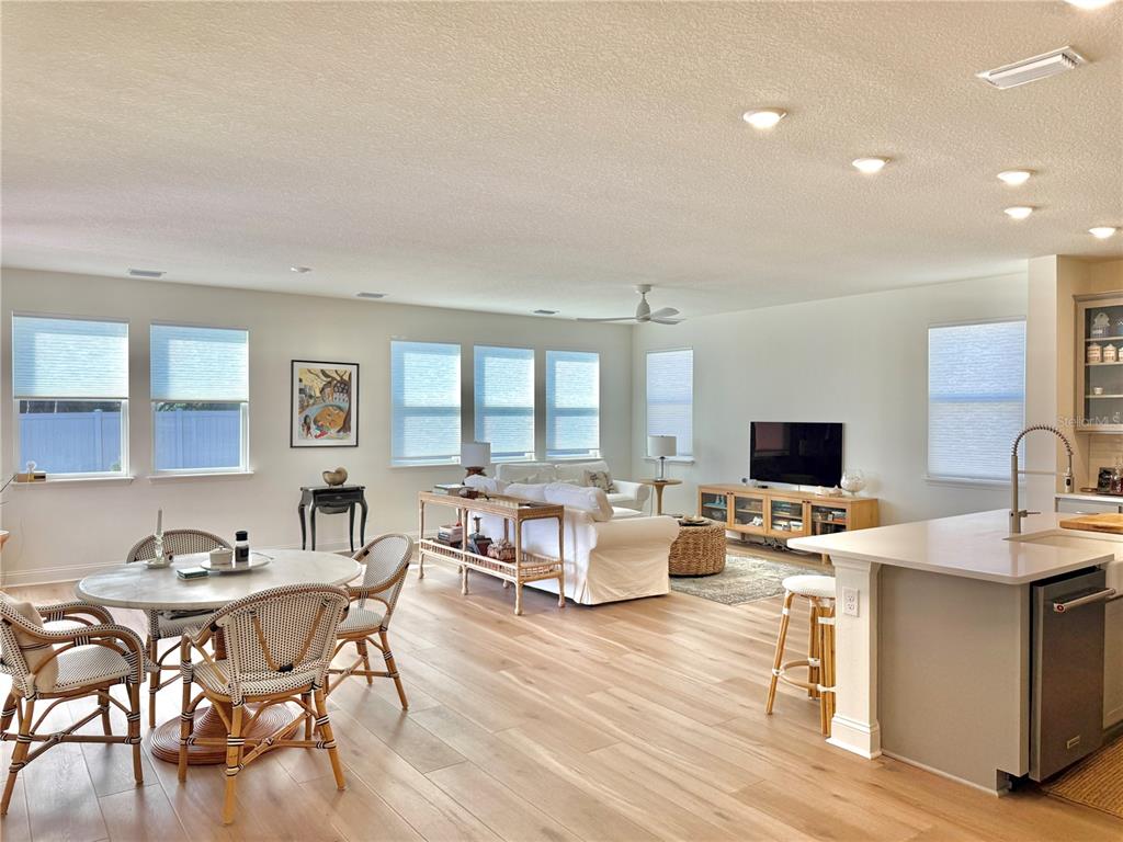 36 Signet Circle Flagler Beach, FL 32136 - Photo 7 of 45 a living room with furniture wooden floor and a flat screen tv