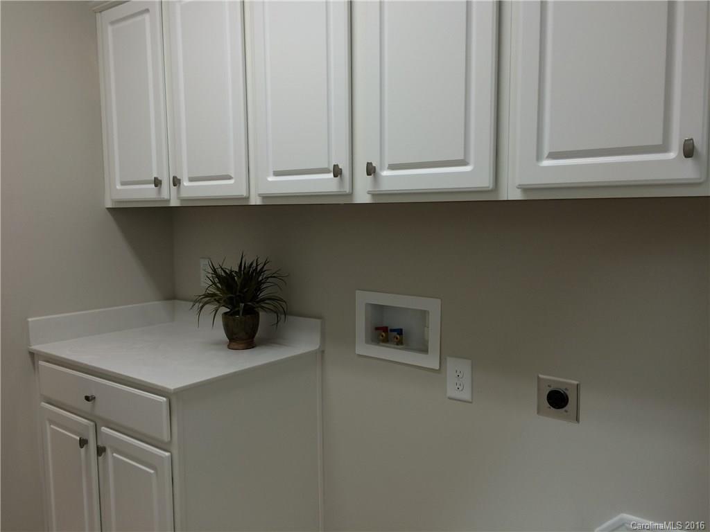 121 Helton Lane, Unit 47 Fort Mill, SC 29708 - Photo 20 of 20 a bathroom with a sink and cabinets