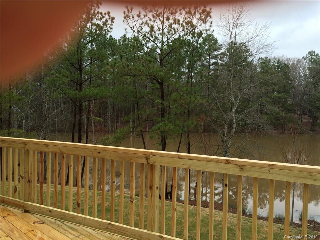 121 Helton Lane, Unit 47 Fort Mill, SC 29708 - Photo 9 of 20 a view of a wooden fence