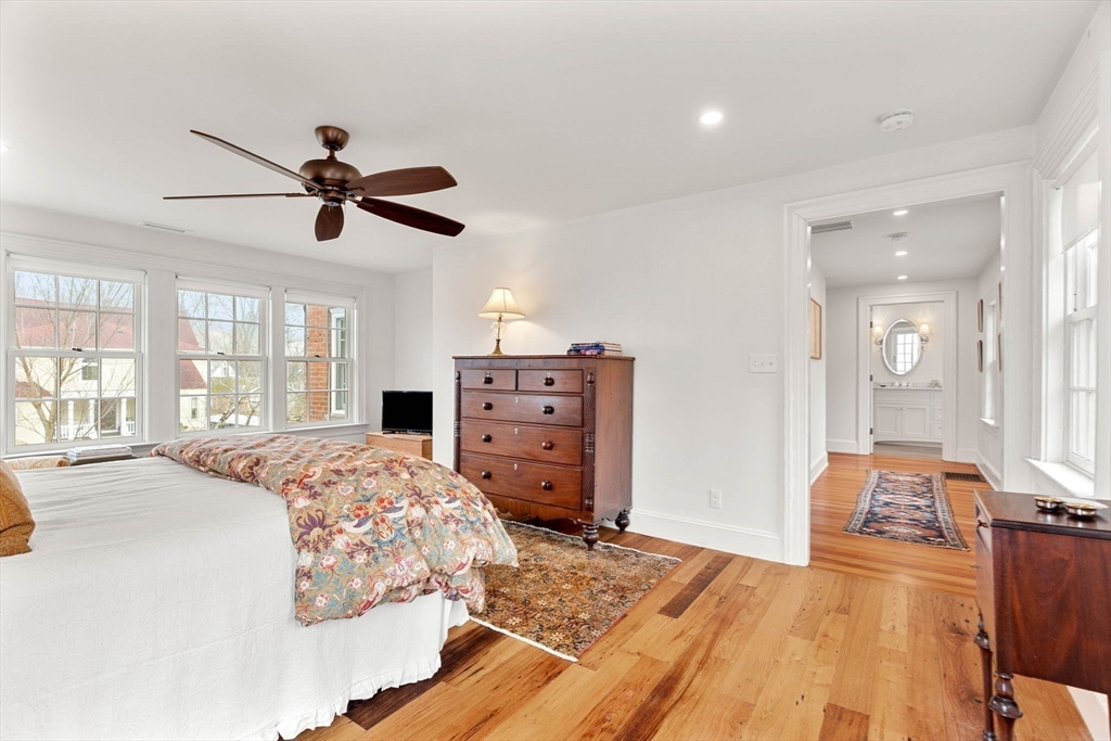 9 Windemere Park Manchester, MA 01944 - Photo 13 of 31 a bedroom with a bed and wooden floors